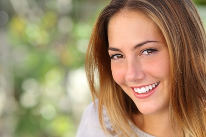 Beautiful woman with a whiten perfect smile